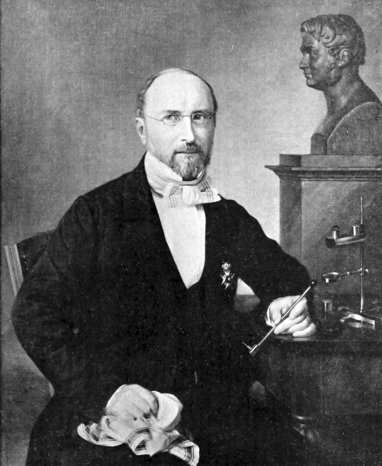 portrait of a man in a black suit